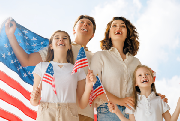 "Happy Independence Day celebration with a loving family, including their amazing autistic child, enjoying the festivities and creating cherished memories together."